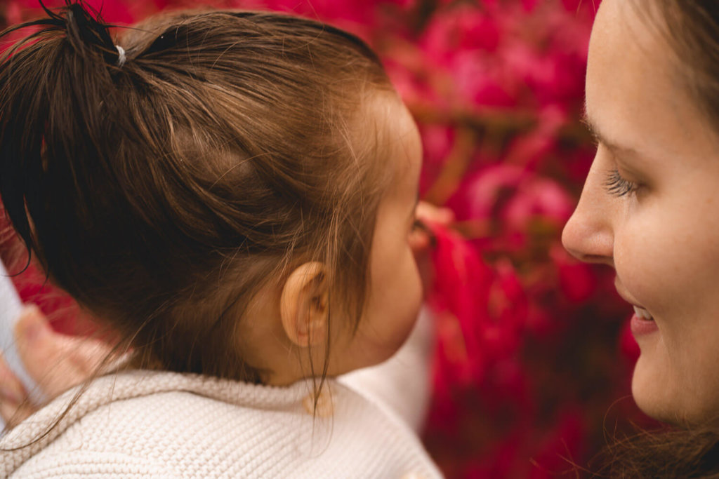 Baby and flower in queen elizabeth park