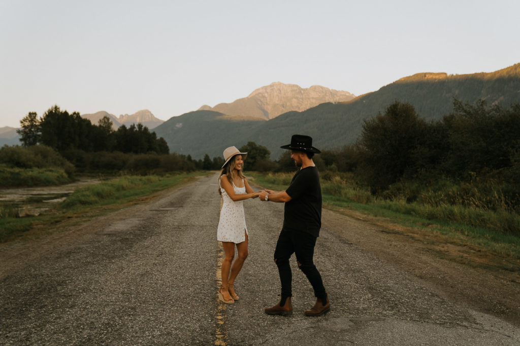 Couple dancing on the road