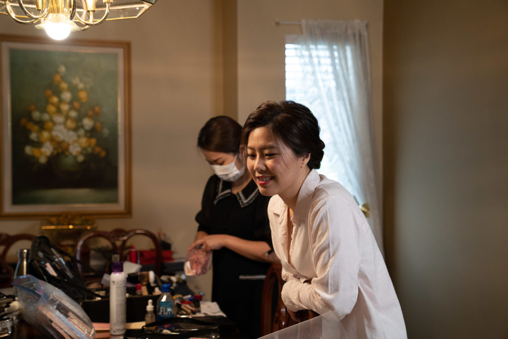 Brides smiling preparation make up