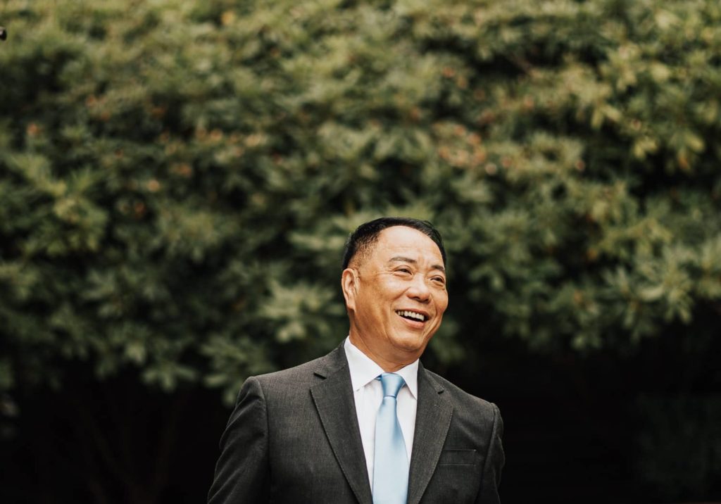 Dad laughing tea ceremony portrait