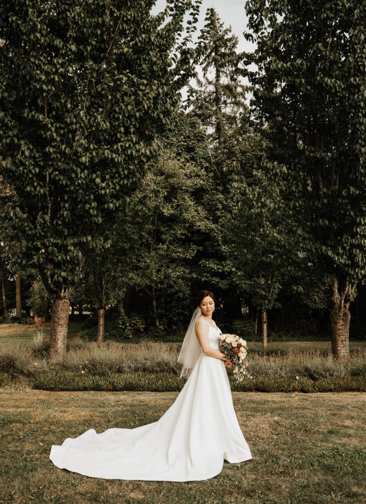 bride with her wedding gown lisa bridal vancouver